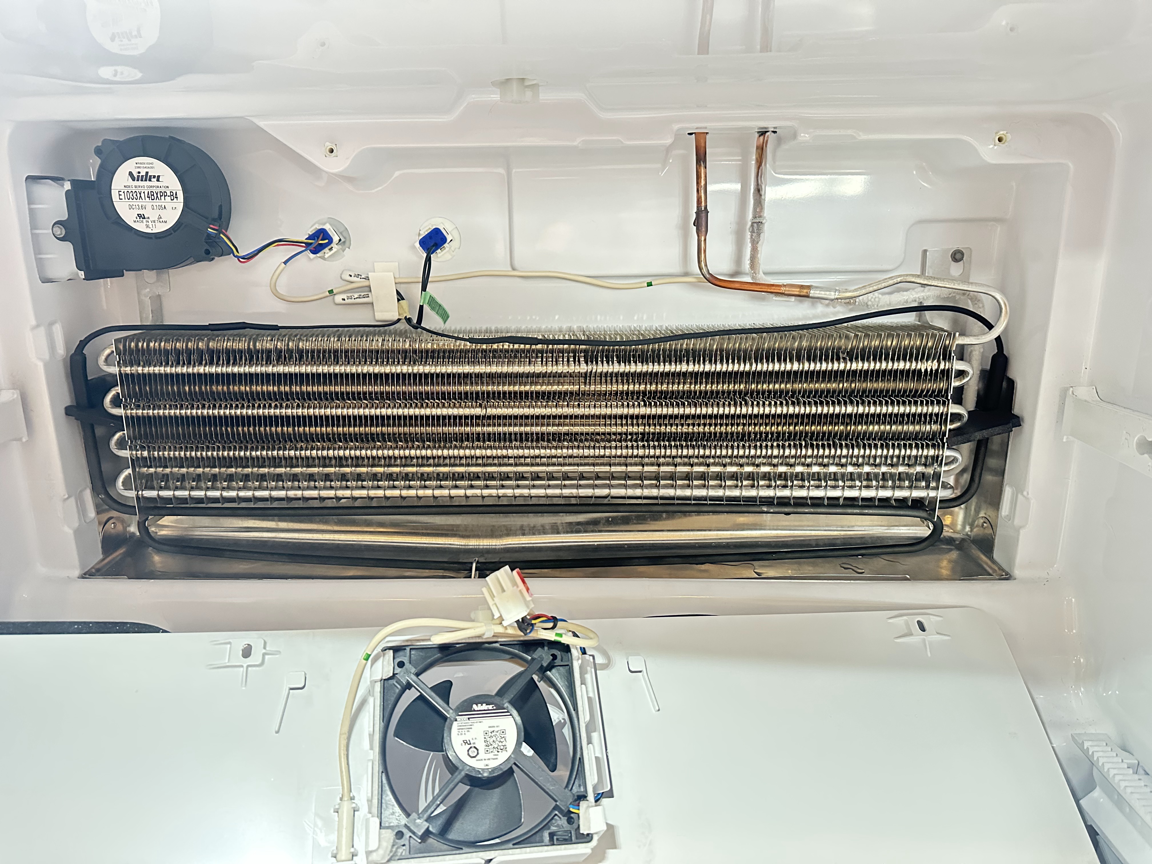 GE refrigerator evaporator compartment during sealed system diagnostics in Sammamish, WA
